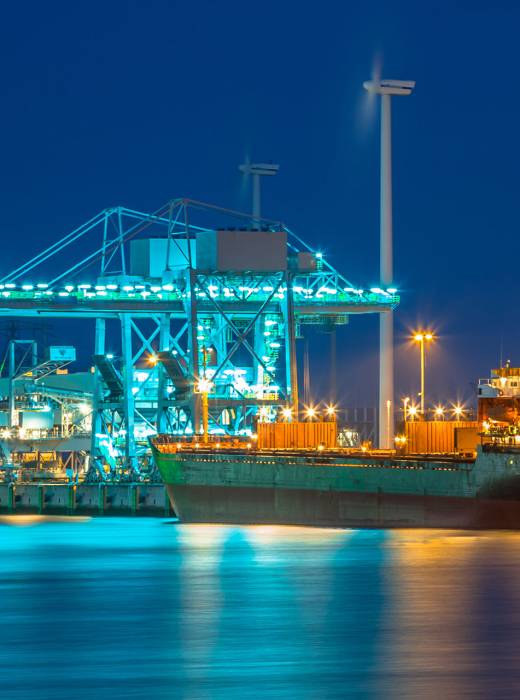 freight-ship-in-a-harbor-at-night-2026-01-09-01-13-27-utc